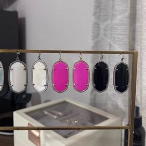 Kendra Scott white, pink, and black earrings
